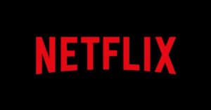 Logotipo vermelho da Netflix sobre fundo preto, representando a plataforma de streaming que alterou regras do plano com anúncios