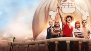 One Piece: Conheça o elenco e as novidades da nova temporada Elenco principal de One Piece live-action reunido no navio Going Merry, com Luffy em destaque erguendo o braço, ao lado de Zoro, Nami, Usopp e Sanji, diante da vela com o símbolo dos Chapéus de Palha