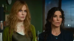 Nicole Kidman e Sandra Bullock aparecem lado a lado em cena de filme com expressão séria