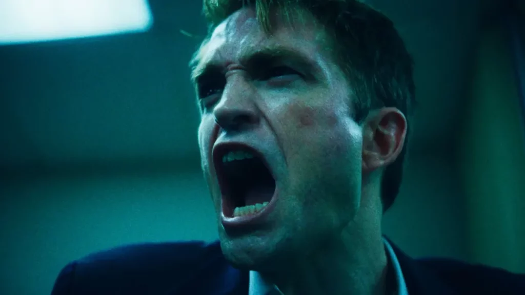 Robert Pattinson em cena de Primetime